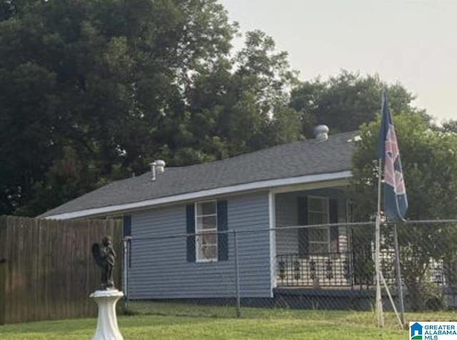 2129 Northland Ave SW, Birmingham, AL 35211 - view of home's exterior featuring a lawn and fence