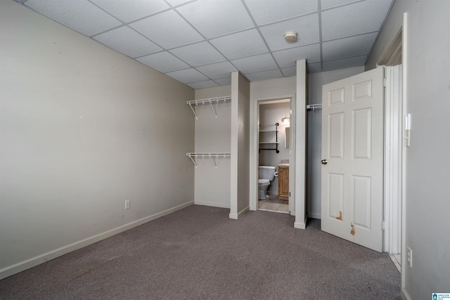 1212 12th St Unit 17, Tuscaloosa, AL 35401 - unfurnished bedroom with a drop ceiling, carpet flooring, baseboards, and ensuite bath