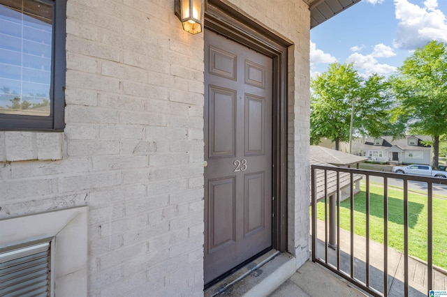1212 12th St Unit 17, Tuscaloosa, AL 35401 - property entrance with a yard