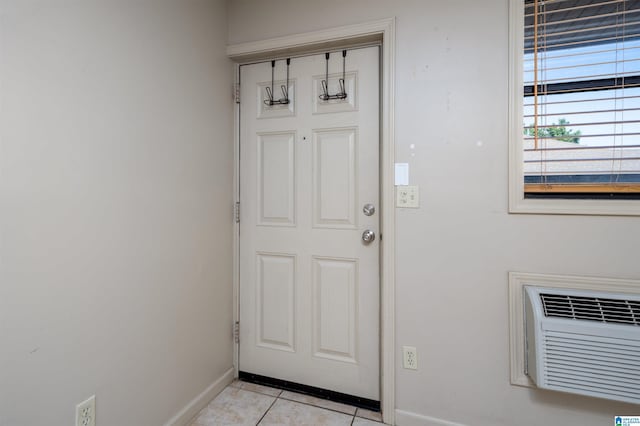 1212 12th St Unit 17, Tuscaloosa, AL 35401 - doorway to outside with baseboards and light tile patterned floors