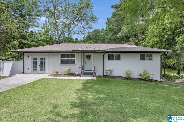 3824 Midway Rd, Adamsville, AL 35005 - single story home featuring a front lawn, fence, french doors, and metal roof