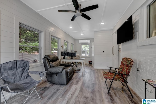 3824 Midway Rd, Adamsville, AL 35005 - living area with ceiling fan, wood walls, recessed lighting, a wall unit AC, and wood finished floors