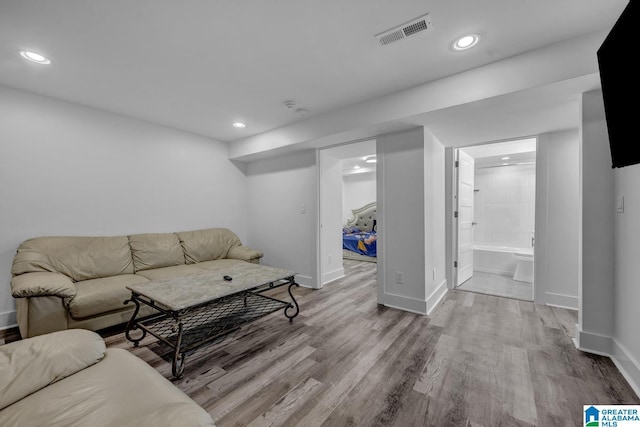 3824 Midway Rd, Adamsville, AL 35005 - living area with recessed lighting, baseboards, visible vents, and wood finished floors