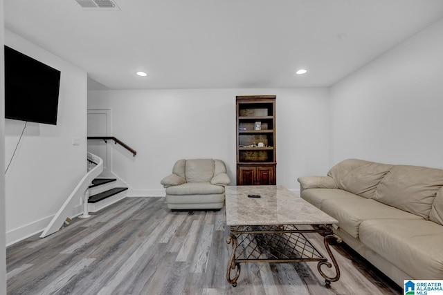 3824 Midway Rd, Adamsville, AL 35005 - living area with stairs, recessed lighting, baseboards, wood finished floors, and visible vents