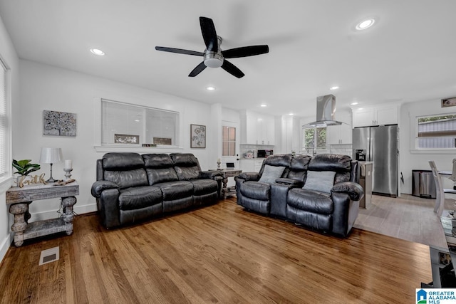 3824 Midway Rd, Adamsville, AL 35005 - living room featuring recessed lighting, ceiling fan, and wood finished floors
