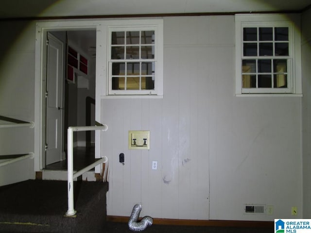 washroom featuring laundry area, hookup for a washing machine, and visible vents