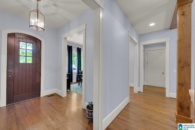 364 Stone Brook Cir, Hoover, AL 35226 - entrance foyer featuring recessed lighting, baseboards, arched walkways, and wood finished floors