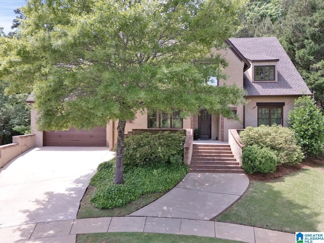 364 Stone Brook Cir, Hoover, AL 35226 - view of front facade featuring concrete driveway, a shingled roof, and stucco siding