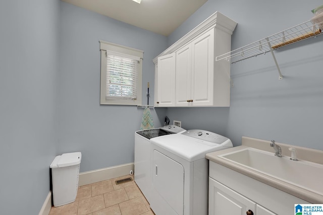 364 Stone Brook Cir, Hoover, AL 35226 - clothes washing area featuring a sink, separate washer and dryer, baseboards, and cabinet space