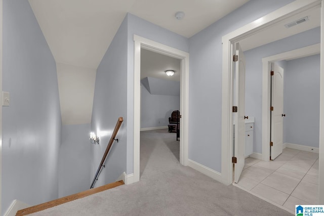 364 Stone Brook Cir, Hoover, AL 35226 - hallway with visible vents, lofted ceiling, light carpet, baseboards, and an upstairs landing