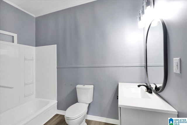 bathroom with vanity, toilet, and wood finished floors
