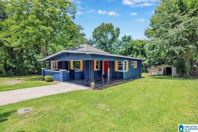 bungalow-style house featuring covered porch and a front lawn