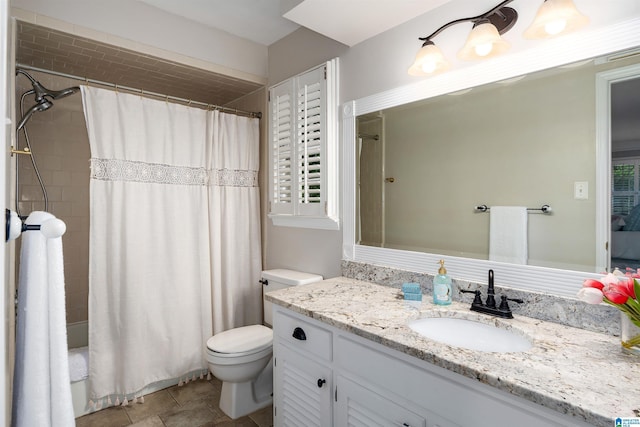 2017 Crossvine Rd, Hoover, AL 35244 - bathroom featuring vanity, toilet, and shower / tub combo