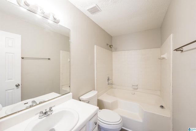 bathroom with vanity, toilet, a textured ceiling, tub / shower combination, and visible vents