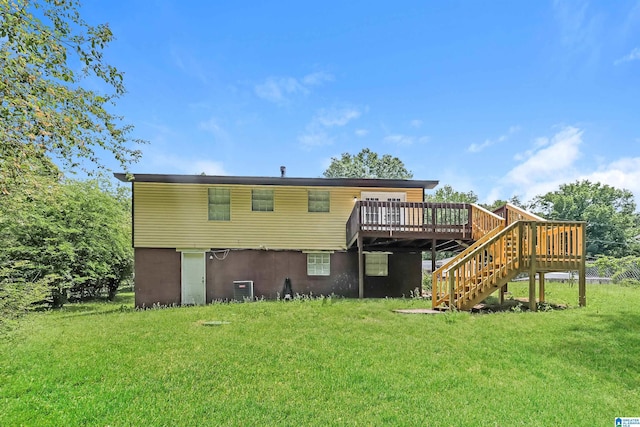 back of house featuring stairs, central AC unit, a yard, and a deck