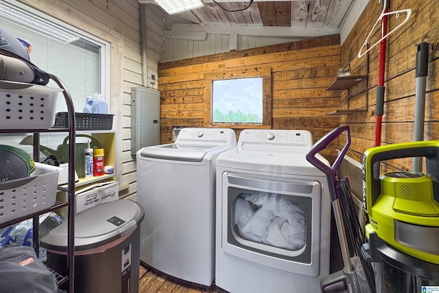 1352 County Road 185, Jemison, AL 35085 - laundry room featuring separate washer and dryer, laundry area, wooden walls, and wood finished floors