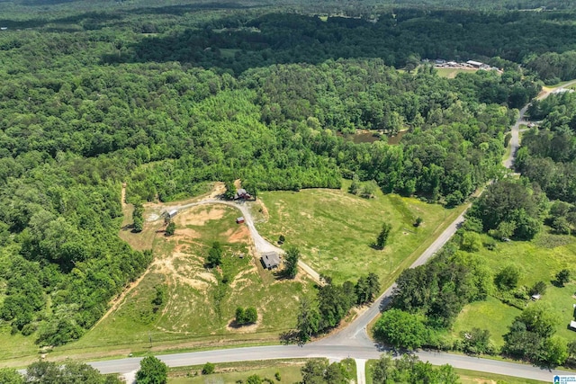 1352 County Road 185, Jemison, AL 35085 - drone / aerial view featuring a wooded view