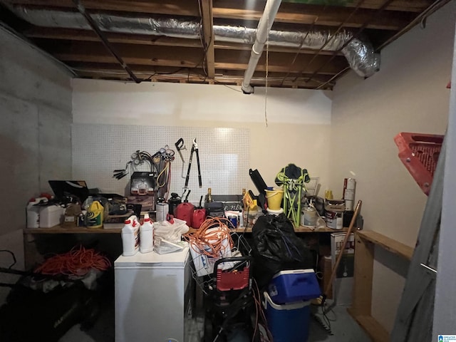 below grade area featuring washer / dryer