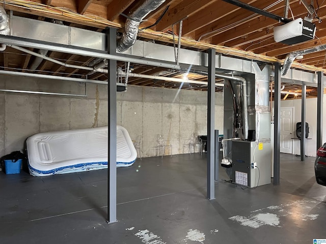 unfinished basement featuring heating unit