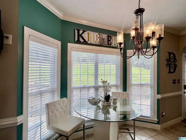 dining space featuring baseboards, ornamental molding, tile patterned flooring, and a notable chandelier