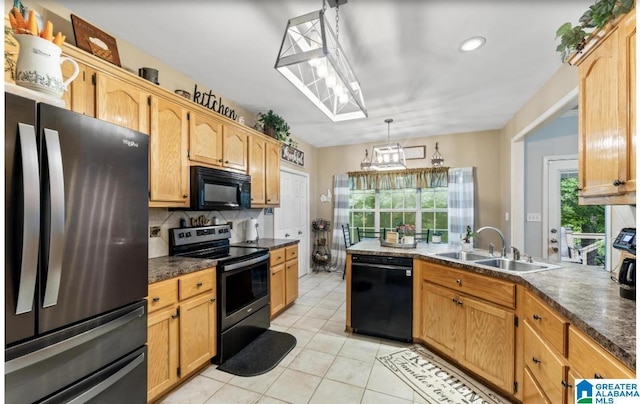 107 Magnolia Ridge Cir, Chelsea, AL 35043 - kitchen featuring dark countertops, tasteful backsplash, a sink, light tile patterned floors, and black appliances