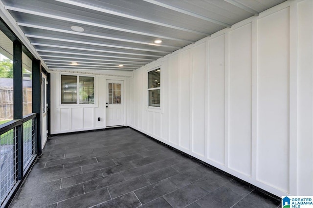 view of unfurnished sunroom