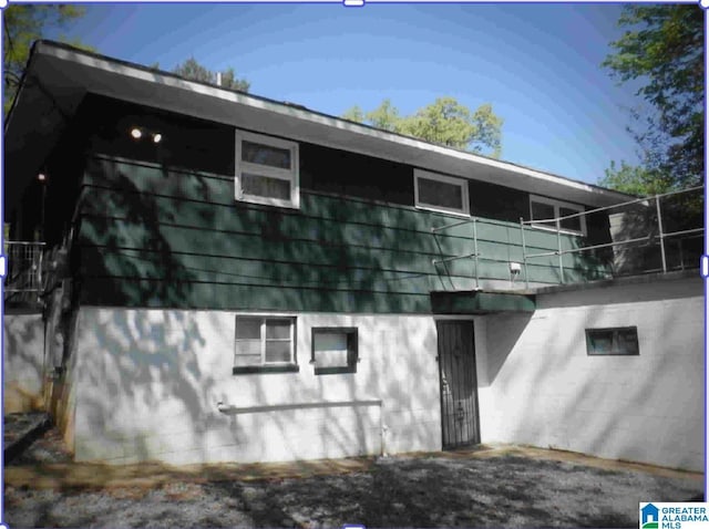 exterior space featuring a balcony