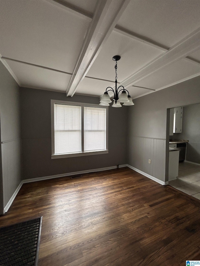 interior space featuring an inviting chandelier, beam ceiling, baseboards, dark wood-type flooring, and visible vents