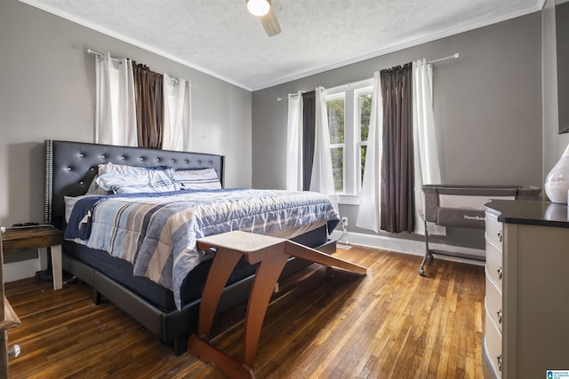 2857 Alexandria Wellington Rd, Alexandria, AL 36250 - bedroom with crown molding, hardwood / wood-style floors, baseboards, ceiling fan, and a textured ceiling