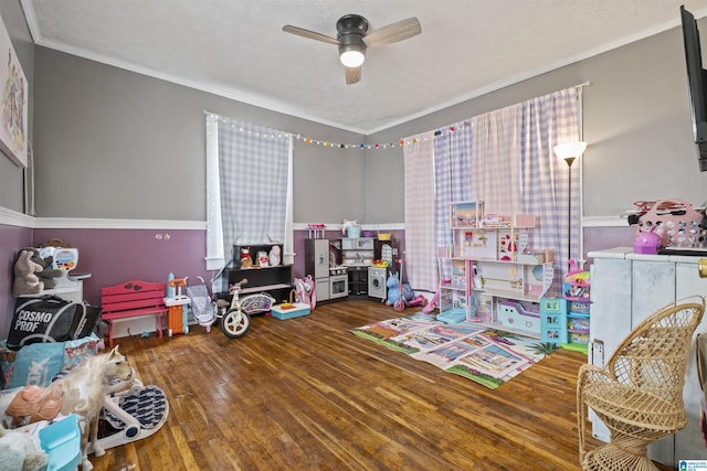 2857 Alexandria Wellington Rd, Alexandria, AL 36250 - recreation room featuring ceiling fan, ornamental molding, and wood finished floors