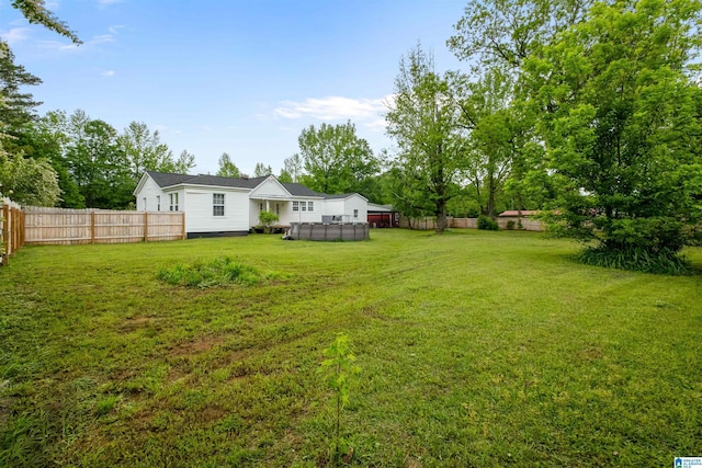 2857 Alexandria Wellington Rd, Alexandria, AL 36250 - view of yard featuring a fenced backyard and a fenced in pool