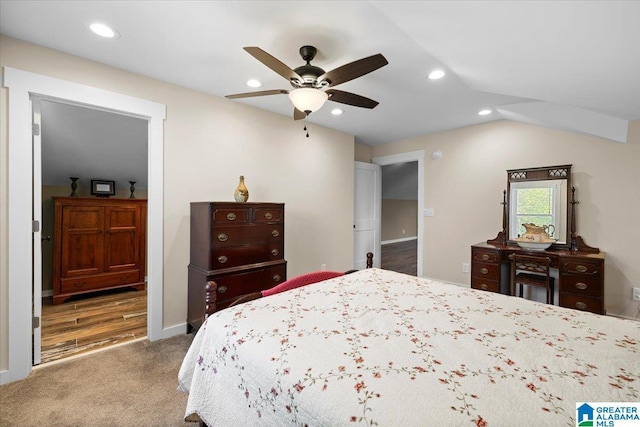 bedroom with recessed lighting, carpet flooring, baseboards, and vaulted ceiling
