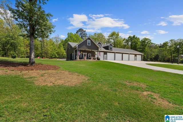 craftsman house with driveway and a front yard