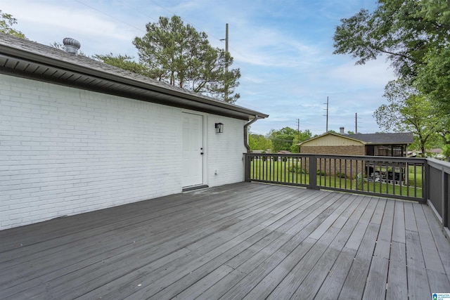 733 Heflin Ave E, Birmingham, AL 35214 - wooden terrace with an outbuilding