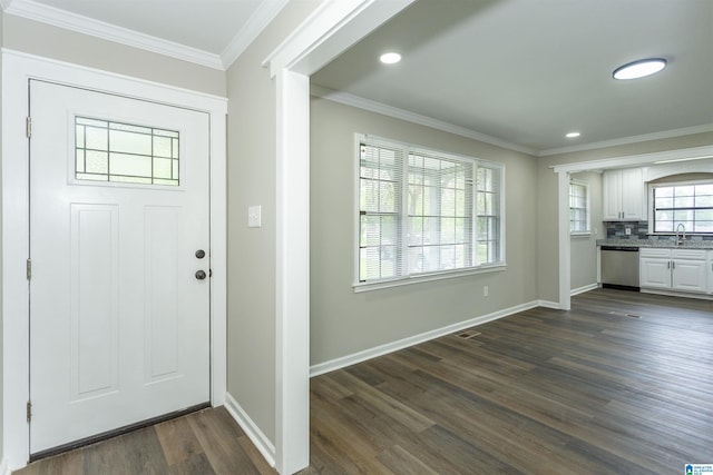733 Heflin Ave E, Birmingham, AL 35214 - foyer entrance with baseboards, ornamental molding, and dark wood finished floors
