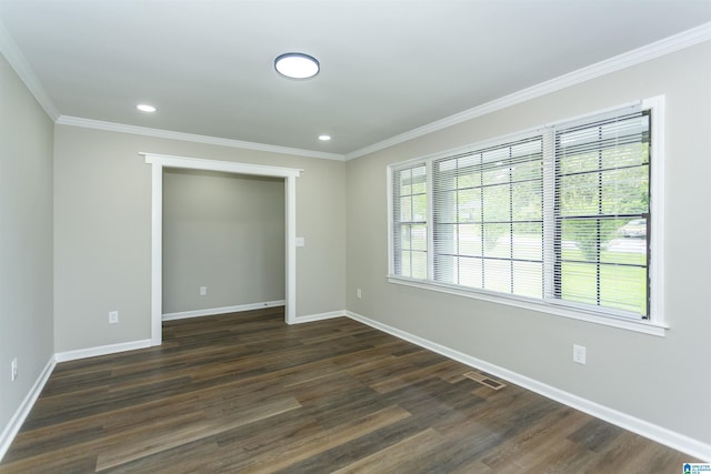 733 Heflin Ave E, Birmingham, AL 35214 - empty room with baseboards, visible vents, and dark wood-style floors