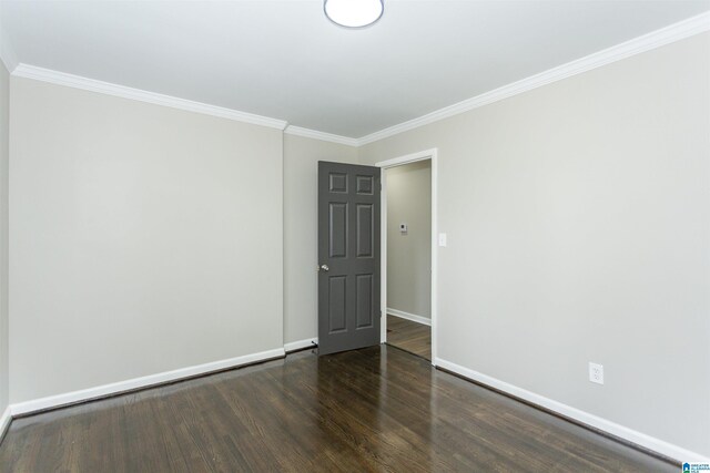 733 Heflin Ave E, Birmingham, AL 35214 - spare room with baseboards, ornamental molding, and wood finished floors