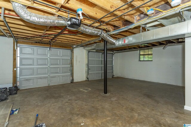 733 Heflin Ave E, Birmingham, AL 35214 - garage featuring a garage door opener