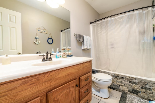 full bath featuring vanity, tile patterned flooring, toilet, and shower / bathtub combination with curtain