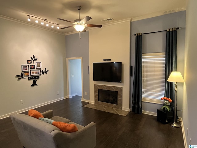 1516 James Hill Way, Hoover, AL 35226 - living area with ornamental molding, a fireplace, a ceiling fan, and wood finished floors