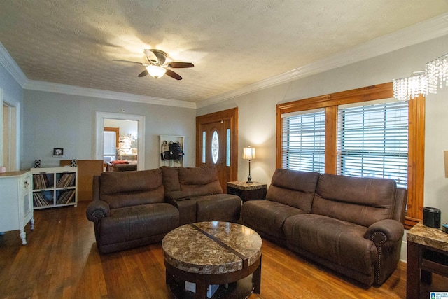 402 8th St, Clanton, AL 35045 - living room featuring a ceiling fan, wood finished floors, and crown molding
