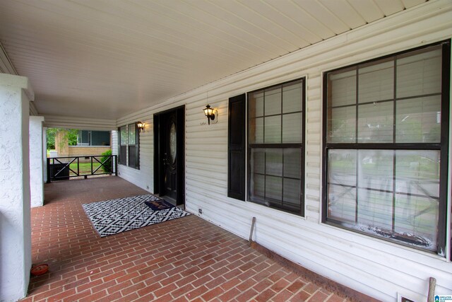 402 8th St, Clanton, AL 35045 - view of patio / terrace with a porch