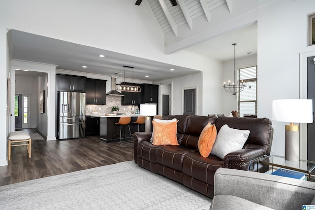 3304 Trip Run, Hoover, AL 35244 - living room featuring a chandelier, dark wood finished floors, healthy amount of natural light, recessed lighting, and beam ceiling