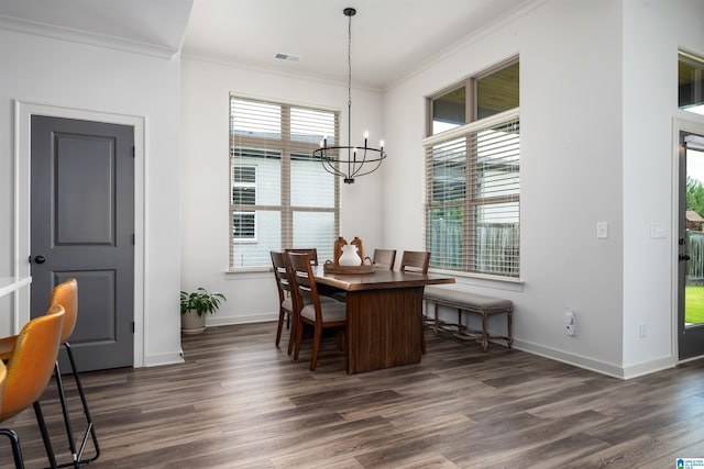 3304 Trip Run, Hoover, AL 35244 - dining room with crown molding, a chandelier, baseboards, and dark wood finished floors