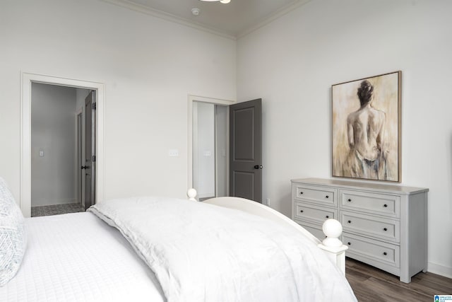 3304 Trip Run, Hoover, AL 35244 - bedroom featuring crown molding, dark wood-style flooring, and baseboards