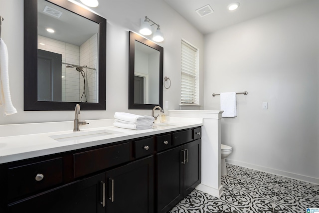 3304 Trip Run, Hoover, AL 35244 - full bath featuring double vanity, toilet, baseboards, and a tile shower