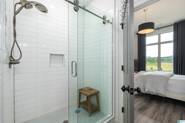 3304 Trip Run, Hoover, AL 35244 - bathroom featuring a stall shower, wood finished floors, and ensuite bathroom