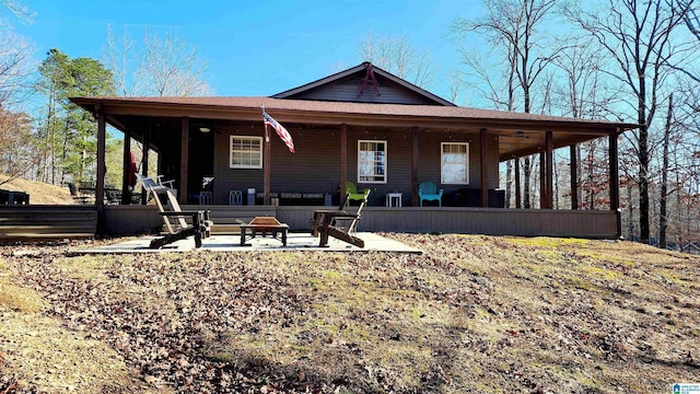 back of property featuring a patio