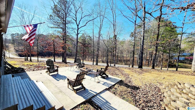 view of patio / terrace with a fire pit