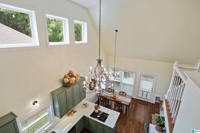 room details featuring an inviting chandelier and wood finished floors